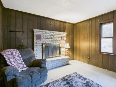 Discover your perfect starter home or getaway retreat just on Garland Resort and Golf Club  in Michigan - for sale on GolfHomes.com, golf home, golf lot