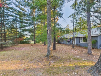Discover your perfect starter home or getaway retreat just on Garland Resort and Golf Club  in Michigan - for sale on GolfHomes.com, golf home, golf lot
