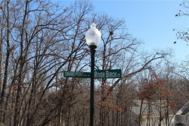 This property features 2 combined lots, creating a spacious on The Club At Porto Cima in Missouri - for sale on GolfHomes.com, golf home, golf lot