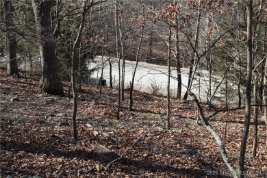 This property features 2 combined lots, creating a spacious on The Club At Porto Cima in Missouri - for sale on GolfHomes.com, golf home, golf lot