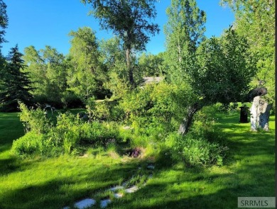 Secluded Waterfront Retreat on 1.5 Acres.This stunning 4-bedroom on Jefferson Hills Golf Course in Idaho - for sale on GolfHomes.com, golf home, golf lot