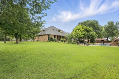 Discover a harmonious blend of elegance and serenity with this on Split Rail Links and Golf Club in Texas - for sale on GolfHomes.com, golf home, golf lot