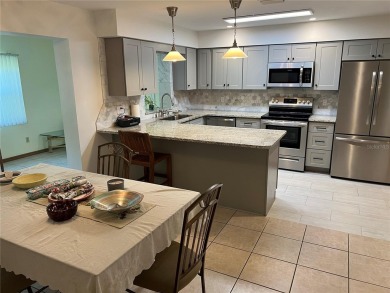 This lovely renovated Augusta model villa is located in the on Candler Hills Golf and Country Club in Florida - for sale on GolfHomes.com, golf home, golf lot