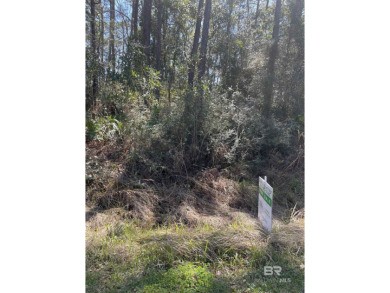 Beautiful wooded lot located on Dauphin Island near the Gulf of on Isle Dauphine Club Golf Course in Alabama - for sale on GolfHomes.com, golf home, golf lot