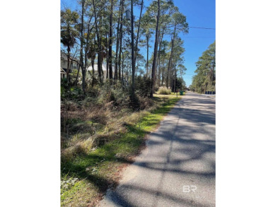 Beautiful wooded lot located on Dauphin Island near the Gulf of on Isle Dauphine Club Golf Course in Alabama - for sale on GolfHomes.com, golf home, golf lot