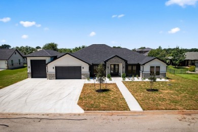 This lovely home is located behind the gates of the Legends on on Legends Golf Course in Texas - for sale on GolfHomes.com, golf home, golf lot