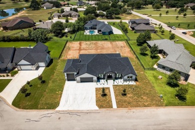 This lovely home is located behind the gates of the Legends on on Legends Golf Course in Texas - for sale on GolfHomes.com, golf home, golf lot