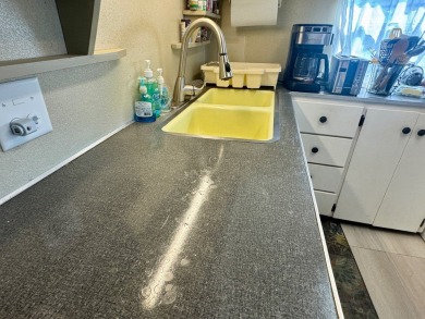 This classic 1958 mobile home is an oldie but a goodie, offering on Heather Hills Golf Course in Florida - for sale on GolfHomes.com, golf home, golf lot