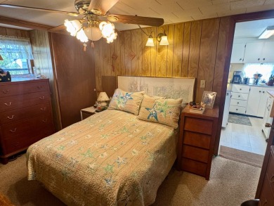 This classic 1958 mobile home is an oldie but a goodie, offering on Heather Hills Golf Course in Florida - for sale on GolfHomes.com, golf home, golf lot