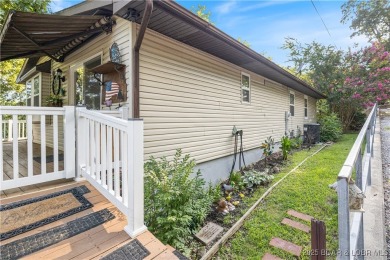 Welcome to this charming 3-bedroom, 2.5-bathroom home, ideally on Bear Creek Valley Golf Club in Missouri - for sale on GolfHomes.com, golf home, golf lot