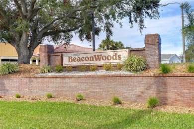 Welcome to this delightful home nestled on a beautifully on Beacon Woods Golf Club in Florida - for sale on GolfHomes.com, golf home, golf lot