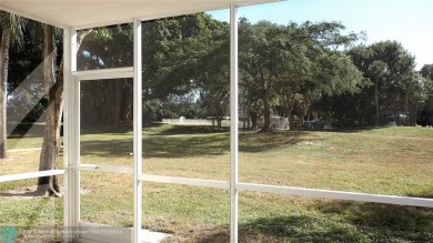*Fully renovated first-floor condo in lush Palm Aire featuring on Palm-Aire Country Club and Resort - Palms in Florida - for sale on GolfHomes.com, golf home, golf lot