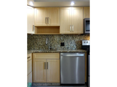 *Fully renovated first-floor condo in lush Palm Aire featuring on Palm-Aire Country Club and Resort - Palms in Florida - for sale on GolfHomes.com, golf home, golf lot