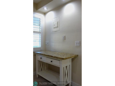 *Fully renovated first-floor condo in lush Palm Aire featuring on Palm-Aire Country Club and Resort - Palms in Florida - for sale on GolfHomes.com, golf home, golf lot