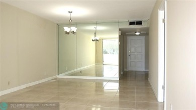 *Fully renovated first-floor condo in lush Palm Aire featuring on Palm-Aire Country Club and Resort - Palms in Florida - for sale on GolfHomes.com, golf home, golf lot