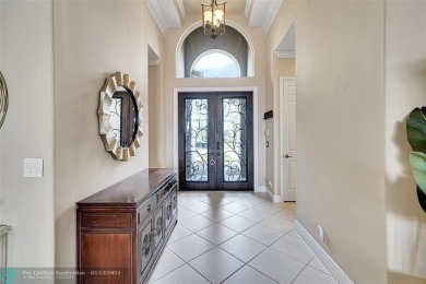 Over $100k of Updates, Impact Glass Windows on the front and on Heron Bay Golf Club in Florida - for sale on GolfHomes.com, golf home, golf lot