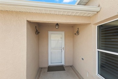 Welcome Home into the style and comfort with this beautifully on The Links of Spruce Creek in Florida - for sale on GolfHomes.com, golf home, golf lot