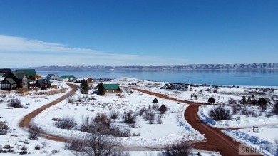 Amazing lake and mountain views from this lot in Fish Haven on Bear Lake West Golf and Country Club in Idaho - for sale on GolfHomes.com, golf home, golf lot