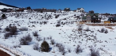 Amazing lake and mountain views from this lot in Fish Haven on Bear Lake West Golf and Country Club in Idaho - for sale on GolfHomes.com, golf home, golf lot