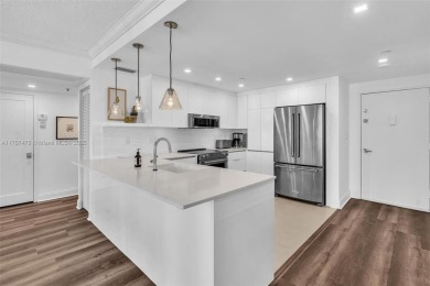 This beautiful 2 bedroom/ 2 bathroom condo has gorgeous views of on Turnberry Isle Resort and Club in Florida - for sale on GolfHomes.com, golf home, golf lot