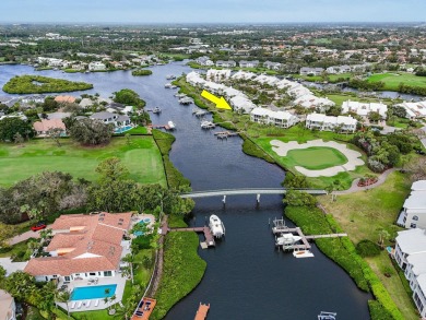 Discover the epitome of waterfront living in this perfect on The Club At Admirals Cove Golf Village in Florida - for sale on GolfHomes.com, golf home, golf lot