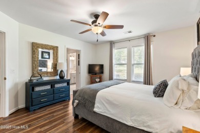 Welcome to this exceptional end-unit first-floor condominium on Carolina National Golf Club in North Carolina - for sale on GolfHomes.com, golf home, golf lot