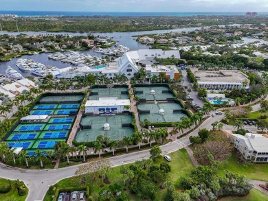 Discover the epitome of waterfront living in this perfect on The Club At Admirals Cove Golf Village in Florida - for sale on GolfHomes.com, golf home, golf lot