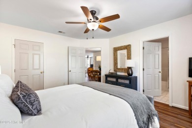Welcome to this exceptional end-unit first-floor condominium on Carolina National Golf Club in North Carolina - for sale on GolfHomes.com, golf home, golf lot