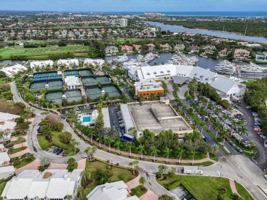 Discover the epitome of waterfront living in this perfect on The Club At Admirals Cove Golf Village in Florida - for sale on GolfHomes.com, golf home, golf lot