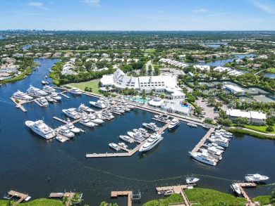 Discover the epitome of waterfront living in this perfect on The Club At Admirals Cove Golf Village in Florida - for sale on GolfHomes.com, golf home, golf lot