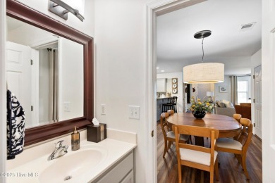 Welcome to this exceptional end-unit first-floor condominium on Carolina National Golf Club in North Carolina - for sale on GolfHomes.com, golf home, golf lot