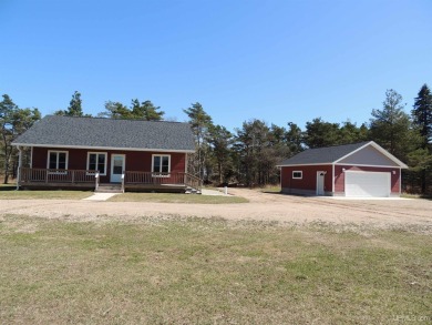 Just pack your bags and move right in to this immaculate totally on Nahma Club in Michigan - for sale on GolfHomes.com, golf home, golf lot
