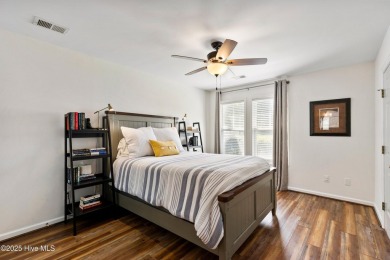 Welcome to this exceptional end-unit first-floor condominium on Carolina National Golf Club in North Carolina - for sale on GolfHomes.com, golf home, golf lot