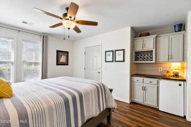 Welcome to this exceptional end-unit first-floor condominium on Carolina National Golf Club in North Carolina - for sale on GolfHomes.com, golf home, golf lot