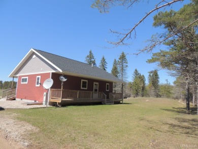 Just pack your bags and move right in to this immaculate totally on Nahma Club in Michigan - for sale on GolfHomes.com, golf home, golf lot