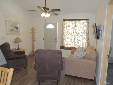 Just pack your bags and move right in to this immaculate totally on Nahma Club in Michigan - for sale on GolfHomes.com, golf home, golf lot