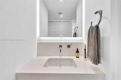 This beautiful 2 bedroom/ 2 bathroom condo has gorgeous views of on Turnberry Isle Resort and Club in Florida - for sale on GolfHomes.com, golf home, golf lot