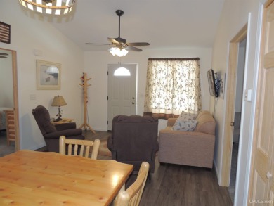 Just pack your bags and move right in to this immaculate totally on Nahma Club in Michigan - for sale on GolfHomes.com, golf home, golf lot