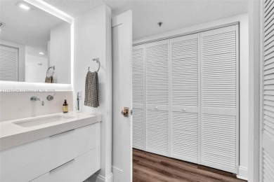 This beautiful 2 bedroom/ 2 bathroom condo has gorgeous views of on Turnberry Isle Resort and Club in Florida - for sale on GolfHomes.com, golf home, golf lot