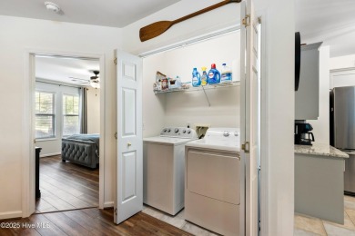 Welcome to this exceptional end-unit first-floor condominium on Carolina National Golf Club in North Carolina - for sale on GolfHomes.com, golf home, golf lot