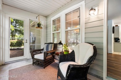 Welcome to this exceptional end-unit first-floor condominium on Carolina National Golf Club in North Carolina - for sale on GolfHomes.com, golf home, golf lot