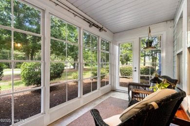 Welcome to this exceptional end-unit first-floor condominium on Carolina National Golf Club in North Carolina - for sale on GolfHomes.com, golf home, golf lot