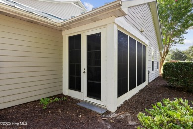 Welcome to this exceptional end-unit first-floor condominium on Carolina National Golf Club in North Carolina - for sale on GolfHomes.com, golf home, golf lot