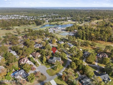 Welcome to an exquisite, custom built, 1.5 story home on a on Olde Point Golf and Country Club in North Carolina - for sale on GolfHomes.com, golf home, golf lot