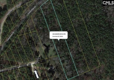 Experience the best of both worlds with this wooded lot located on Oak Hills Golf Club in South Carolina - for sale on GolfHomes.com, golf home, golf lot