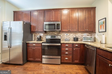 Welcome to easy, one-level living in this charming two-bedroom on Lanier Island Legacy Golf Couorse in Georgia - for sale on GolfHomes.com, golf home, golf lot