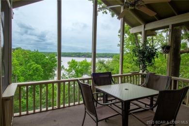 Welcome to your dream retreat in Tan Tar A Estates, an exclusive on The Oaks Golf Course in Missouri - for sale on GolfHomes.com, golf home, golf lot