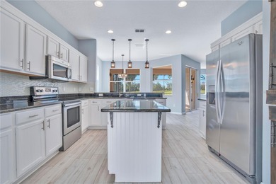 Stunning golf course frontage home in the highly desirable on Stoneybrook West in Florida - for sale on GolfHomes.com, golf home, golf lot