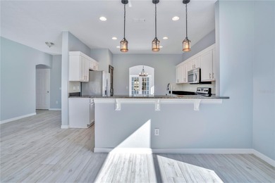 Stunning golf course frontage home in the highly desirable on Stoneybrook West in Florida - for sale on GolfHomes.com, golf home, golf lot