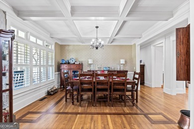 Experience panoramic views of the lake and golf course in this on Summergrove Golf Club in Georgia - for sale on GolfHomes.com, golf home, golf lot